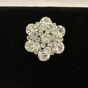 Vintage clear rhinestone dome shaped brooch in silver tone base